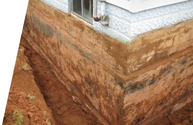 Footing drain installation for basement waterproofing